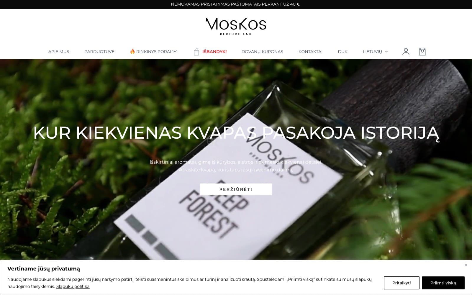 Moskos Perfume Lab storefront in Lithuanian, with the tagline that every scent tells a story.